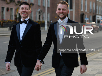 Happy Mark and Cathal walking hand in hand next to Government Buildings just after taking their wedding vows in Dublin's city centre.
On Fri...