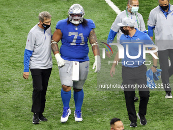 Detroit Lions nose tackle Danny Shelton (71) walks off the field after an injury during the first half of an NFL football game between the D...