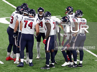 Houston Texans quarterback Deshaun Watson (4) meets with teammates in the huddle during the first half of an NFL football game between the D...