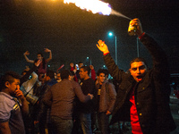 Supporters of Egyptian football club Al-Ahly celebrated on the streets of Heliopolis in Cairo on Friday night after their team beat Zamalek...