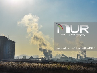 Smoke rises from the chimneys of a factory in Etimesgut district on November 28, 2020 in Ankara, Turkey. (