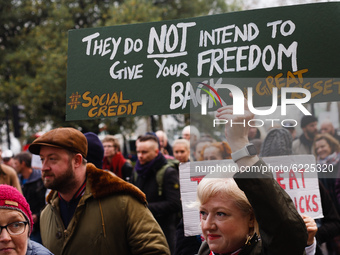 Anti-lockdown activists march from Hyde Park in London, England, on November 28, 2020. London is to return to 'Tier 2' or 'high alert' covid...