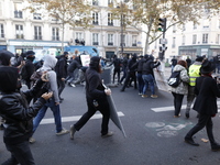 People demonstrates in Paris on November 28, 2020 during a protest against the ''global security'' draft law, which Article 24 would crimina...
