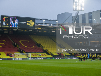Watford do a minute applaud in remembrance to Diego Maridona during the Sky Bet Championship match between Watford and Preston North End at...