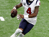 Houston Texans quarterback Deshaun Watson (4) carries the ball during the second half of an NFL football game between the Houston Texans and...