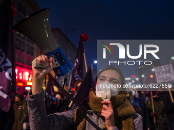 People take part in a demonstration against the new abortion law in Warsaw, Poland, on November 29, 2020. (