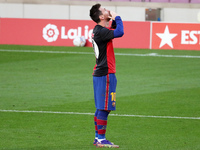 Leo Messi goal celebration with the Tshirt of Newell's in tribute to Diego Armando Maradona during the match between FC Barcelona and CA Osa...