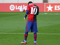 Leo Messi goal celebration with the Tshirt of Newell's in tribute to Diego Armando Maradona during the match between FC Barcelona and CA Osa...