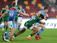 London Irish winger Ben Loader puts in his tackle during the Gallagher Premiership match between London Irish and Leicester Tigers at the Br...