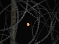 Full moon in Srinagar, Indian Administered Kashmir on 30 November 2020. (