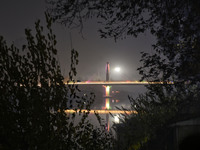 Illuminated view of a bridge over jehlum river in Srinagar, Indian Administered Kashmir on 30 November 2020. (