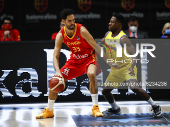 33 Javier Beiran of Spain defended by 02 Giordan Watson of Romania during the FIBA EuroBasket 2022 Qualifiers match of group A between Spain...