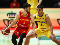 08 Dario Brizuela of Spain defended by 11 Radu Vima of Romania during the FIBA EuroBasket 2022 Qualifiers match of group A between Spain and...