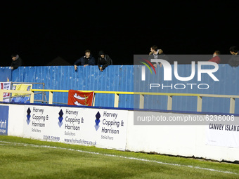 Canvey Island Fans watching the outside on there ladders during  FA Cup Second Round between Canvey Island and Boredom Wood at Park Lane Sta...