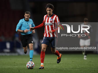 Joao Felix of Atletico Madrid runs with the ball during the UEFA Champions League Group A stage match between Atletico Madrid and FC Bayern...