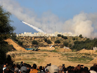 Rockets are fired during a military drill by Palestinian Islamist movement Hamas and other Palestinian armed factions in Gaza City on Decemb...