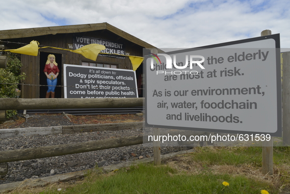 Signs demonstrating, against the gas extraction method of hydraulic fracturing, in Little Plumpton, Lancashire, UK, on Tuesday 9th June 2015...