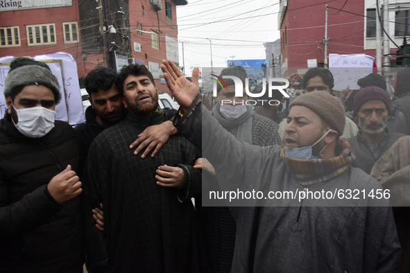 Familymembers of killed alledged militants protest in Srinagar, Indian Administered Kashmir on 04 January 2021. Families of the slain youth...