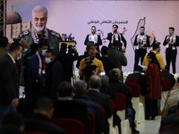 Palestinians attend a ceremony marking the first anniversary of the killing of Iranian Revolutionary Guards commander Qasem Soleimani (portr...