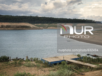FILE - Feb 8th 2015 - A pier is seen hundreds of meters from the actual shore of the Jaguari-Jacareí dam in Bragança Paulista, around 100 km...