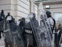 Riot police near the U.S. Capitol on January 06, 2021 in Washington, DC. The protesters stormed the historic building, breaking windows and...