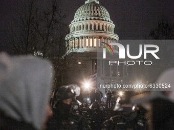 A nightly view of U.S. Capitol on January 06, 2021 in Washington, DC. The protesters stormed the historic building, breaking windows and cla...