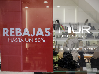 Sale posters are seen in stores at the beginning of the winter sales season in Palma de Mallorca while the autonomic Mallorca government wil...