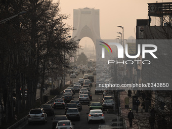 Vehicles travel on a road to Azadi (Freedom) square in western Tehran during a polluted air, following the COVID-19 outbreak in Iran, on Jan...
