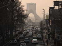 Vehicles travel on a road to Azadi (Freedom) square in western Tehran during a polluted air, following the COVID-19 outbreak in Iran, on Jan...