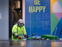     A street cleaner on Market Street in Manchester city centre during the third national lockdown on Thursday 14th January 2021.  (