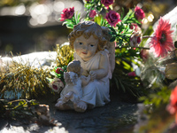 A figurine seen at the memorial commemorating more than 200 children from Bethany Mother and Child Home at Mount Jerome Cemetery in Harold's...