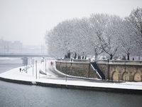 A view over Vistual River and boulevards covered with snow in Krakow, Poland. January 14, 2021.  (