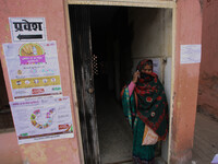 A health worker woman comes out after get vaccinated,  at a hospital  in the outskirts of Allahabad on January 16,2021.India started inocula...