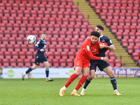  Lee Angol of Leyton Orient of Leyton Orient vies ,Stephen Hendrie of Morecambe during the Sky Bet League Two match between Leyton Orient an...