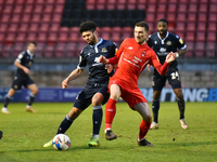 Nat Knight-Percival of Morecambe and Craig Clay of Leyton Orient of Leyton Orient during the Sky Bet League Two match between Leyton Orient...