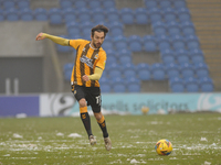 Cambridges Harrison Dunk during the Sky Bet League 2 match between Colchester United and Cambridge United at the Weston Homes Community Stad...