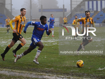  Colchesters Kwame Poku runs at Cambridge defenders during the Sky Bet League 2 match between Colchester United and Cambridge United at the...