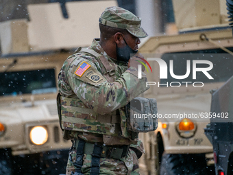 An Ohio National Guard soldier is seen during an armed protest at the Ohio Statehouse ahead of the inauguration of President-elect Joe Biden...