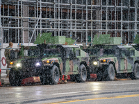 Ohio National Guard soldiers load vehicles in the snow during an armed protest at the Ohio Statehouse ahead of the inauguration of President...