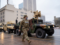 Ohio National Guard vehicles arrive downtown during an armed protest at the Ohio Statehouse ahead of the inauguration of President-elect Joe...