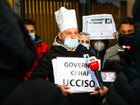 Protest of restaurateurs under the headquarters of the Lombardy Region in Milan on January 21 2021. Restaurateurs protest against the govern...