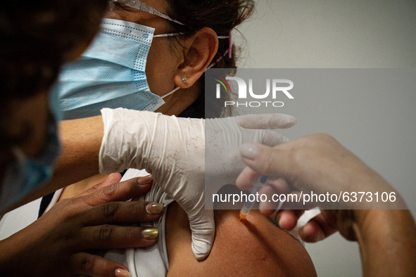 An health worker receive the Sputnik V vaccine in Buenos Aires, Argentina, on January 22, 2021. 