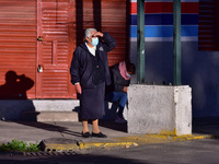   A  person wears face mask while walks amid the rise in positive cases due to new Covid-19 pandemic, Hospitals reaching the limit of their...