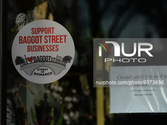 A sticker 'Support Baggot Street Businesses' seen in a closed business promisses in Dublin during Level 5 Covid-19 lockdown. 
On Friday, 22...