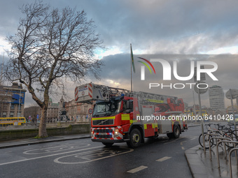 Dublin Fire Brigade vehicle rashing to the accident scene in the center of Dublin. Dublin Fire Brigade officers this afternoon rescued a man...