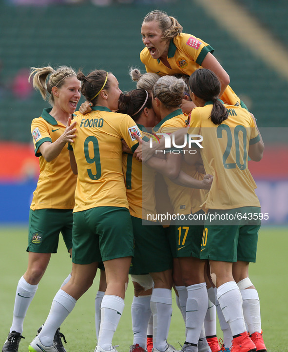 (150617) -- EDMONTON, June 17, 2015 () -- Players of Australia celebrate during the group D match against Sweden at the Commonwealth Stadium...
