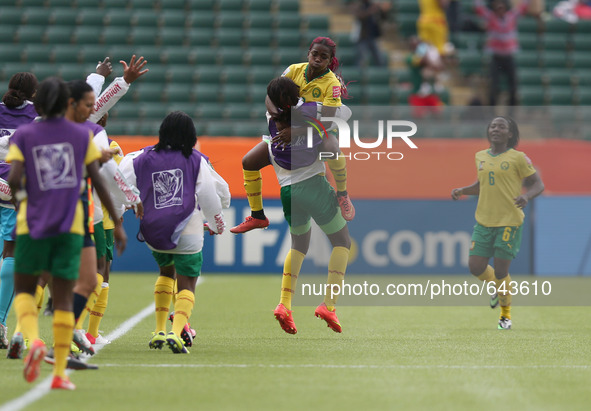 (150617) -- EDMONTON, June 17, 2015 () -- Madeleine Ngono Mani (above) of Cameroon celebrates for score during the group C match against Swi...