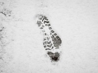A foot mark in the snow in the area of Zografou in Athens, Greece on February 16, 2021. The snowfall called 'Medea' showed up in Greece. (