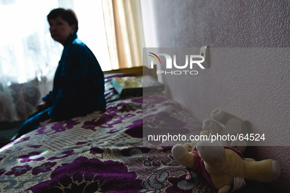 Crimean Tatar woman inside the temporary housing near Kiev as first refugee families arrive in Kyiv from Crimea. 