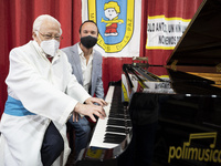  padre Angel and pianist Juan Antonio Simarro offers a Solidarity Concert in the Church of San Antón for the benefit of the homeless in Madr...